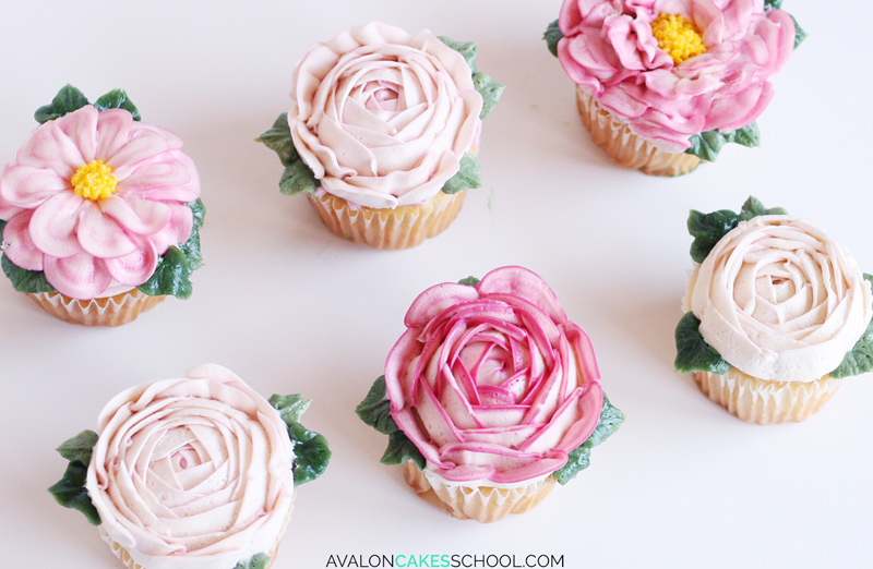 6 cupcakes with pink buttercream flowers