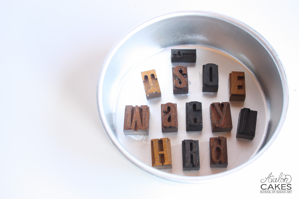 letter blocks in a pan